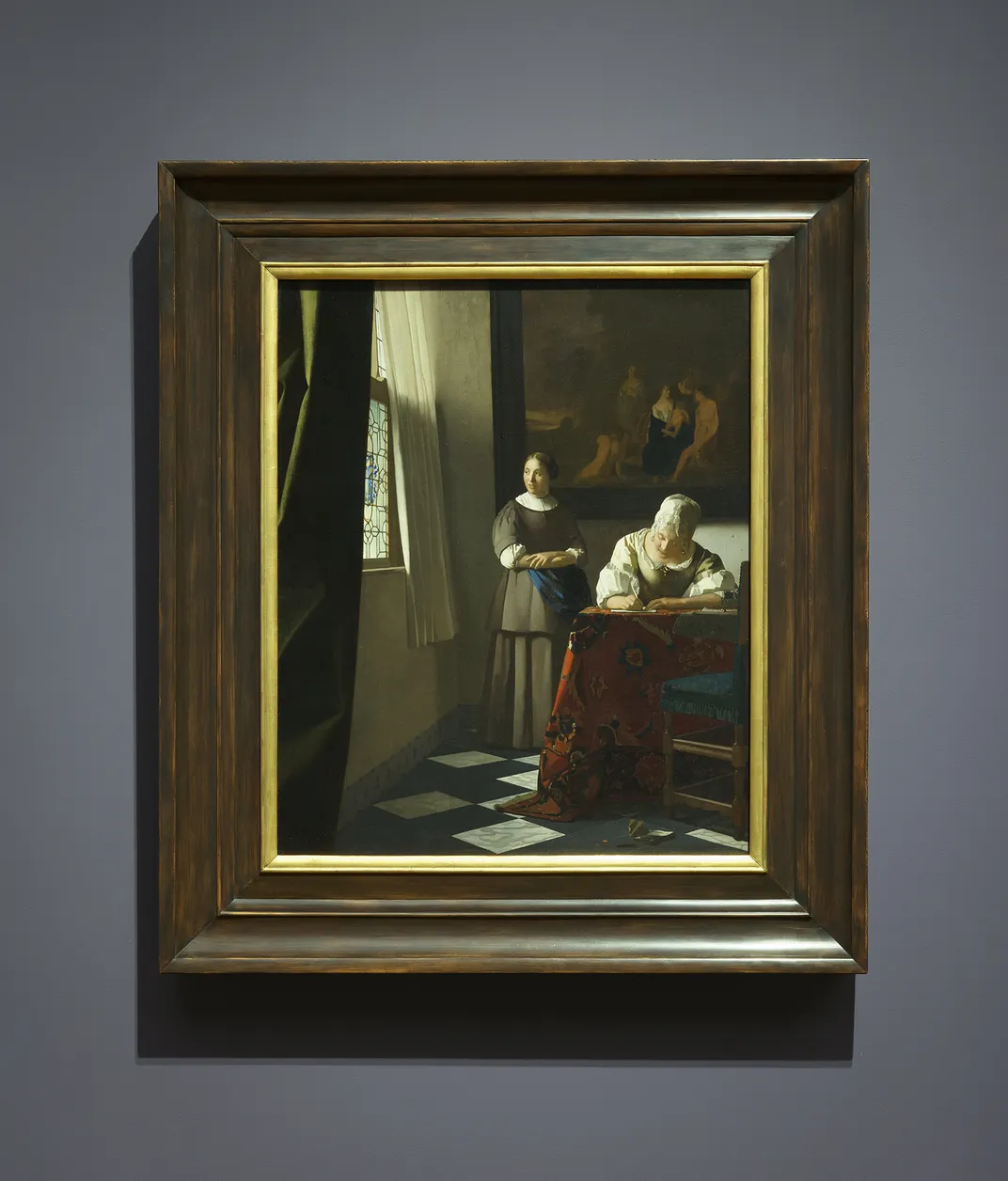 Woman Writing a Letter With Her Maid