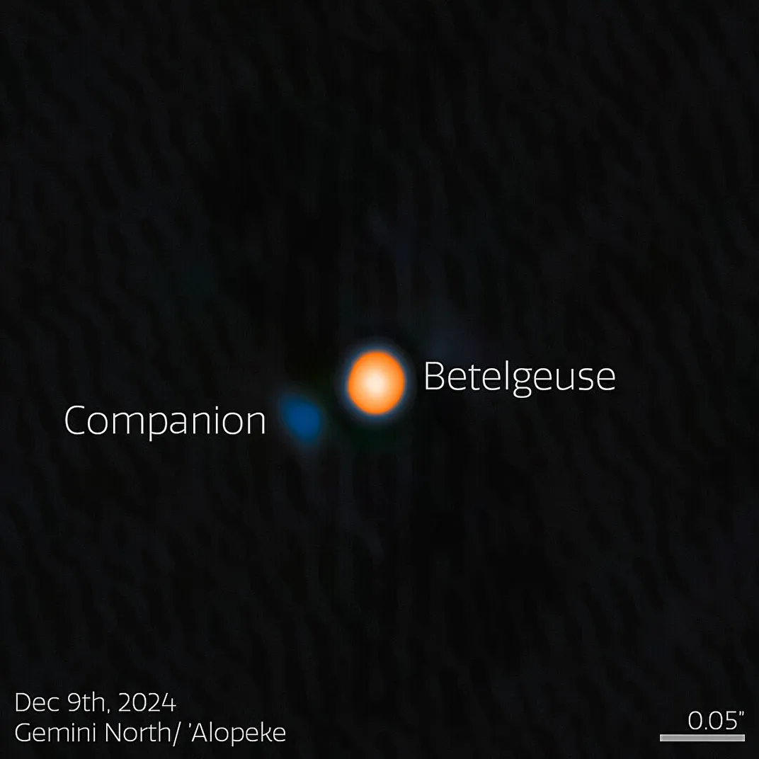 a photo showing betelgeuse, a bright star, and a faint blue companion