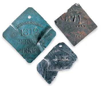 Slave hire badges. 
National Museum of American History