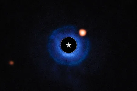 In this image, light from the star TWA 7 has been subtracted. The potential exoplanet&nbsp;TWA 7 b is the orange circle within the blue debris disk.